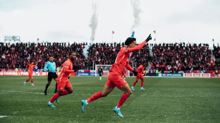 Tajon Buchanan celebrates after scoring Canada's second goal